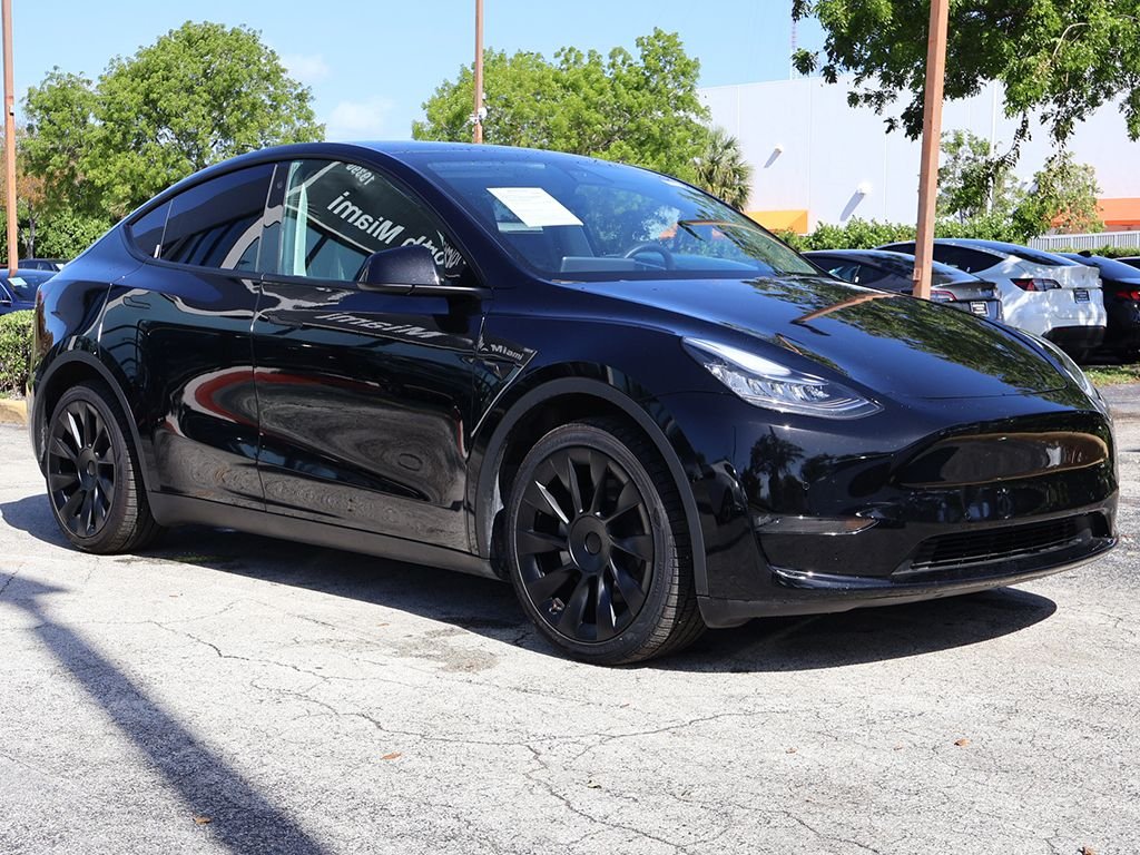 Used 2022 Tesla Model Y Long Range with VIN 7SAYGAEE2NF456635 for sale in Miami, FL