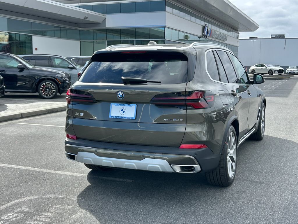 New 2026 Manhattan Green Metallic BMW xDrive50e image 5