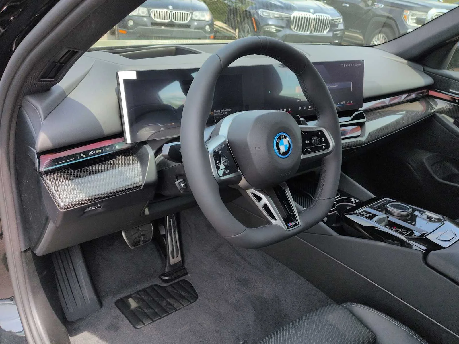 Used 2027 Black Sapphire Metallic BMW 550e xDrive image 10