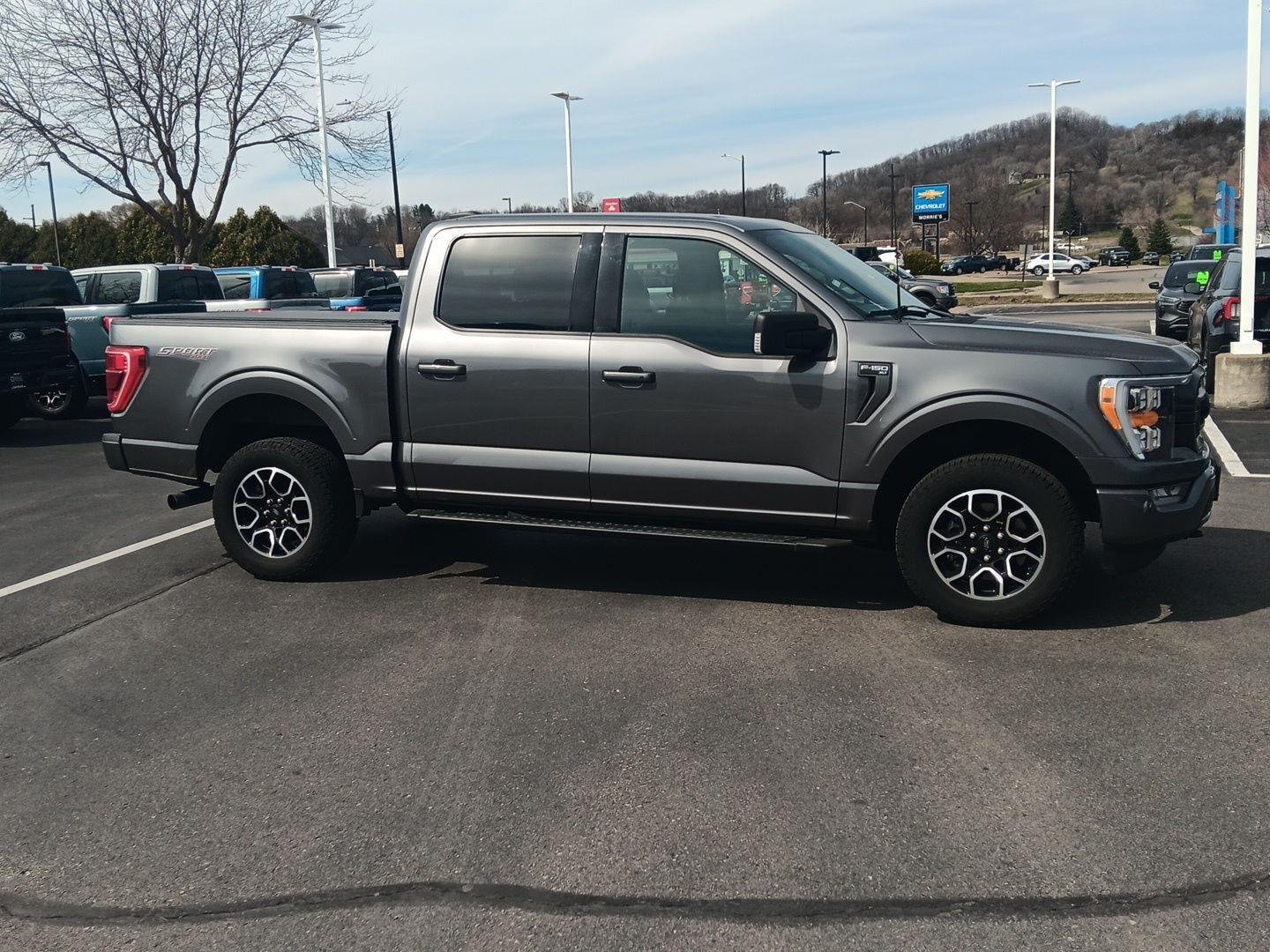 Used 2021 Ford F-150 XLT with VIN 1FTFW1E87MFC80631 for sale in Winona, Minnesota