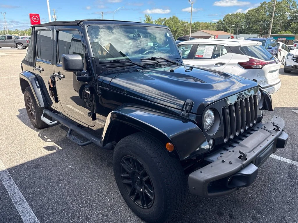 Used 2017 Black Jeep Unlimited Sahara image 3