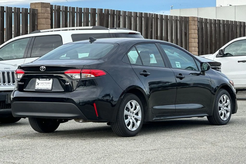 Used 2025 Midnight Black Metallic Toyota LE image 4