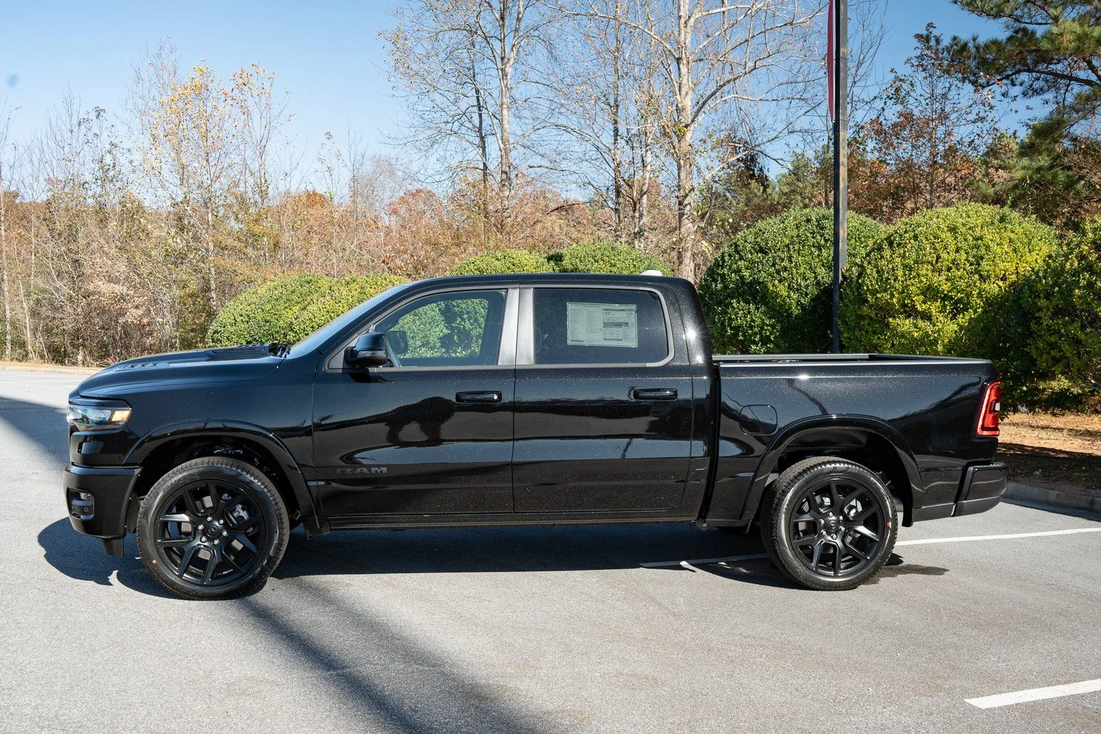 New 2026 Diamond Black Crystal Pearl-Coat Exterior Paint RAM Laramie image 5