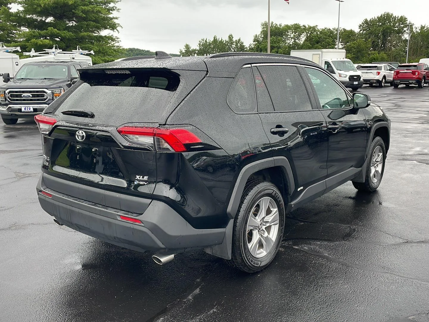 Used 2025 MIDNIGHT BLACK METALLIC TOYOTA TRUCK HYBRID XLE image 5