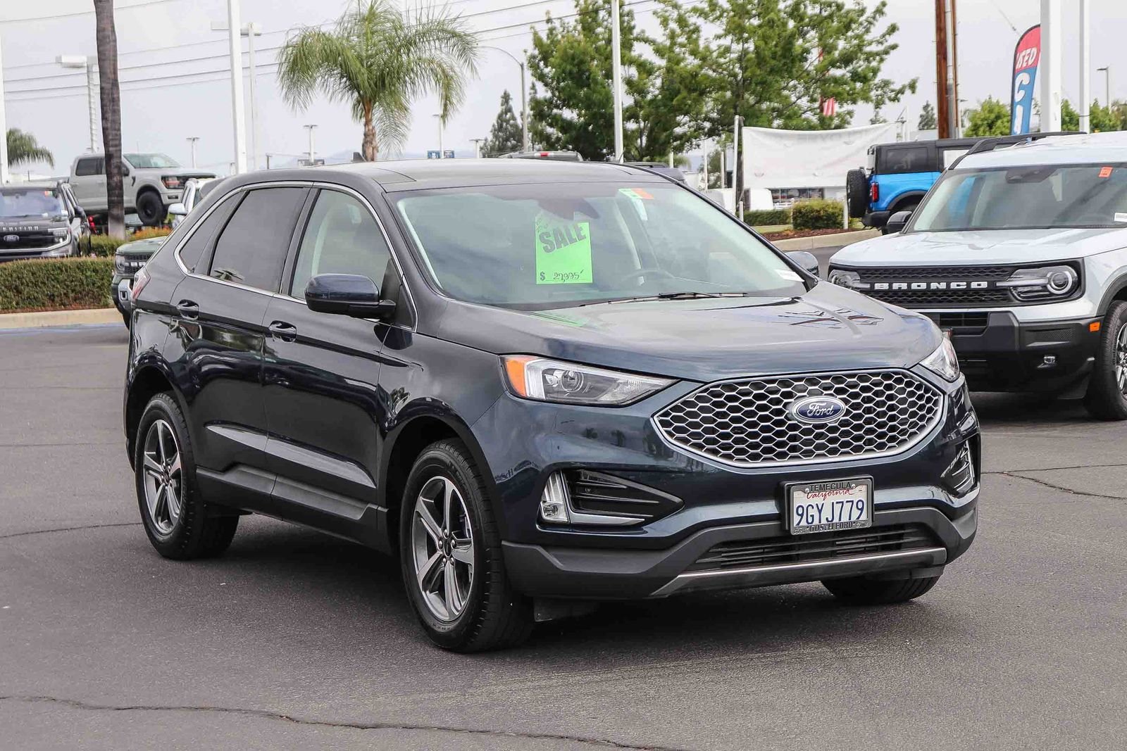 Certified Used 2023 Blue Metallic Ford SEL image 3
