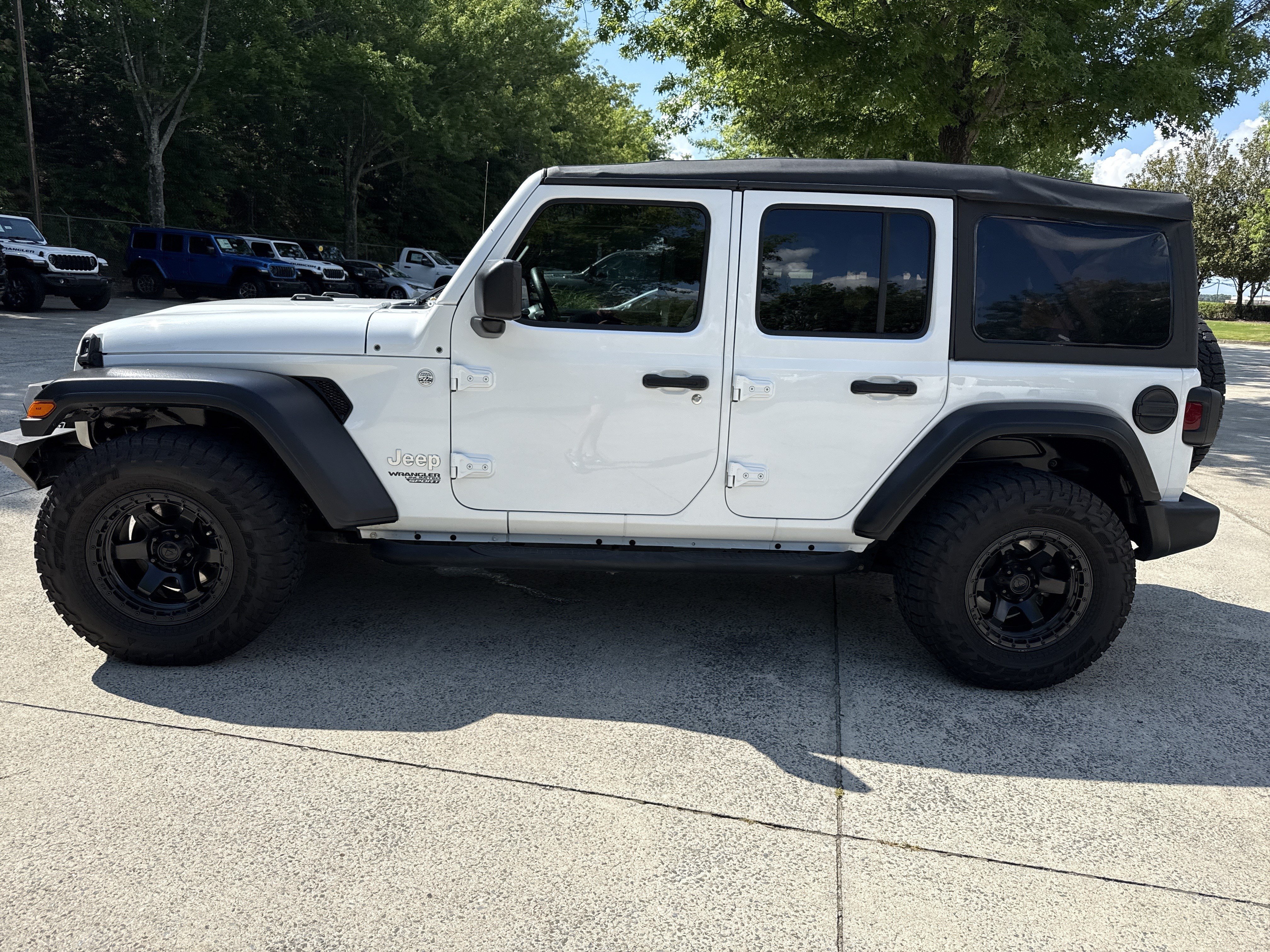 Used 2021 Bright White Clearcoat Jeep Unlimited Sport image 4