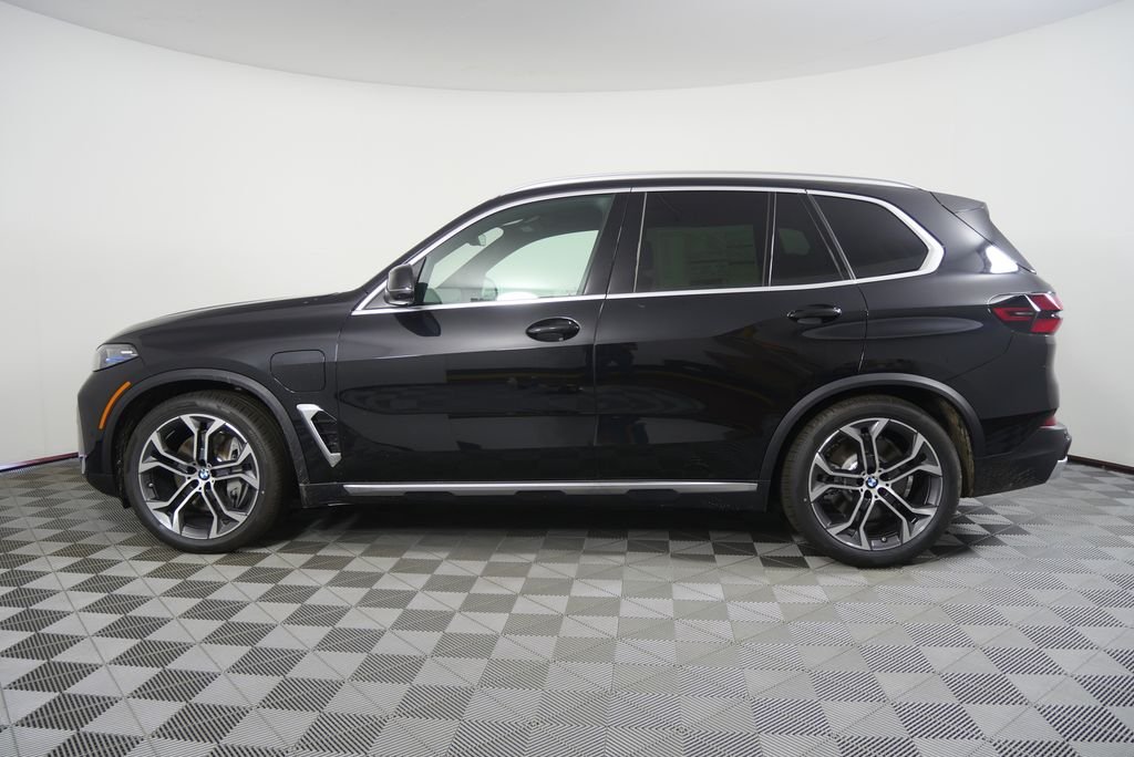 New 2026 Black Sapphire Metallic BMW xDrive50e image 7
