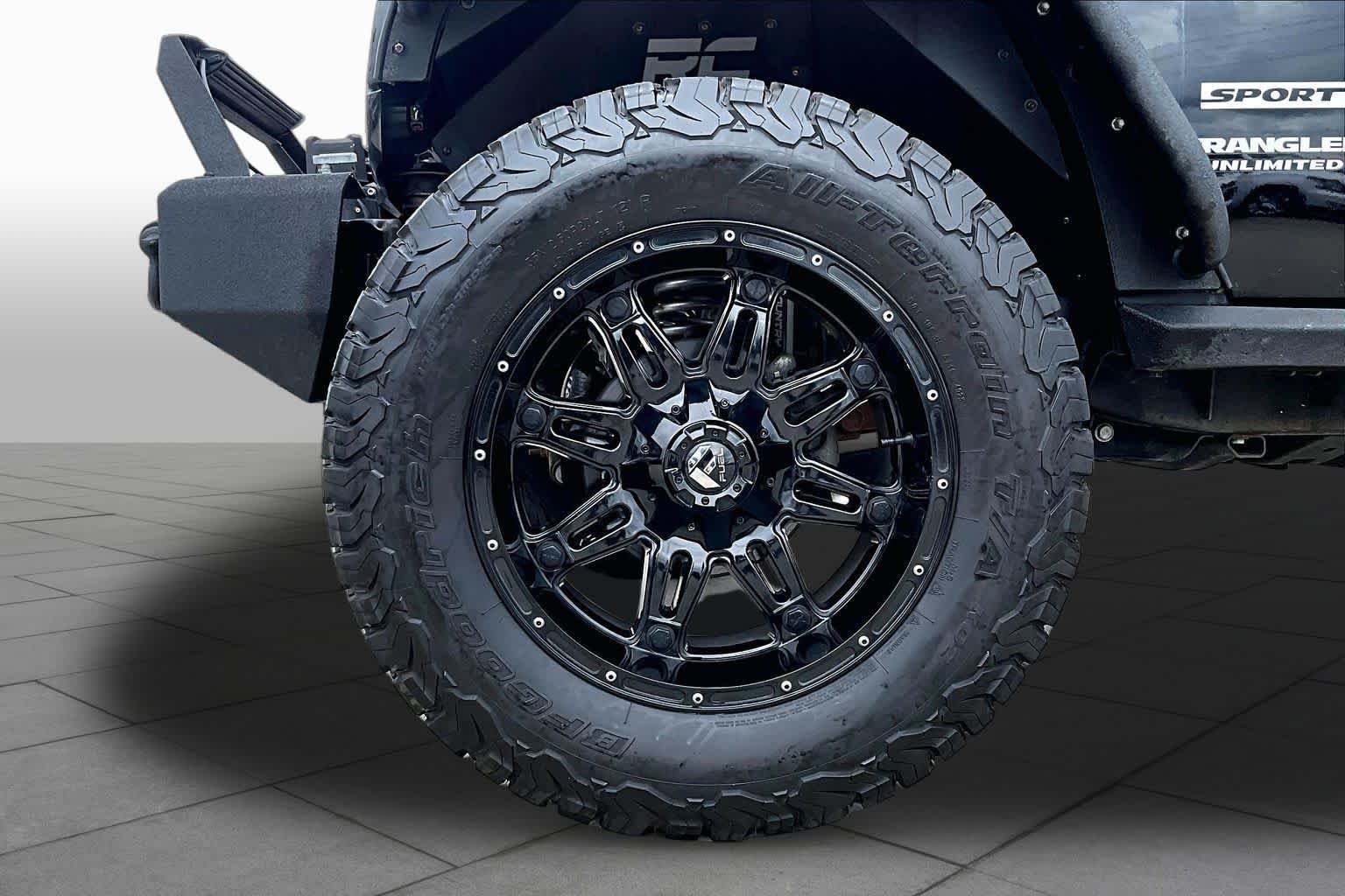 Used 2014 Black Clearcoat Jeep Sport image 10