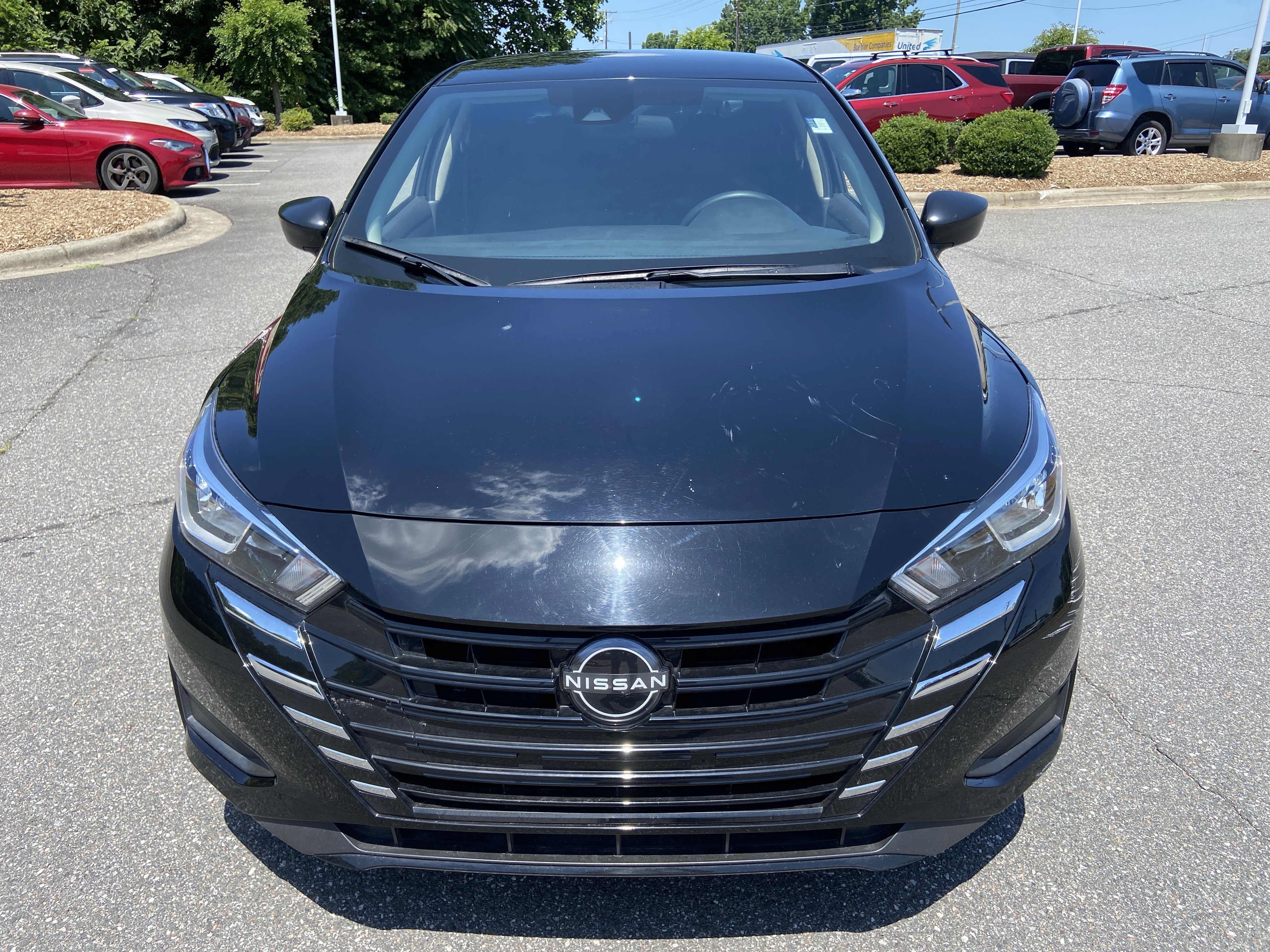 Used 2023 Super Black Nissan S image 2