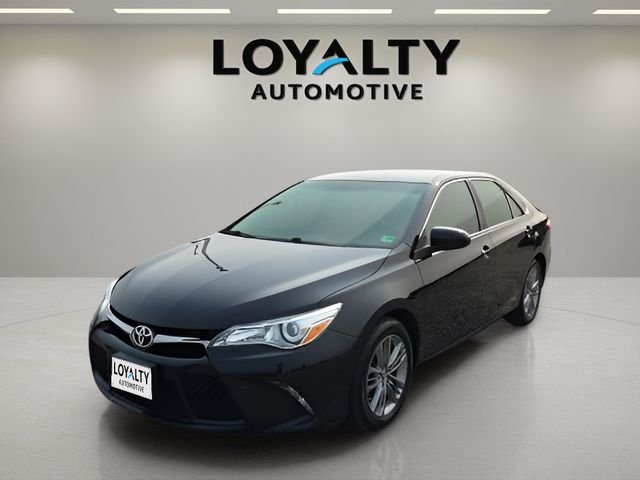Used 2015 Black Toyota LE image 1