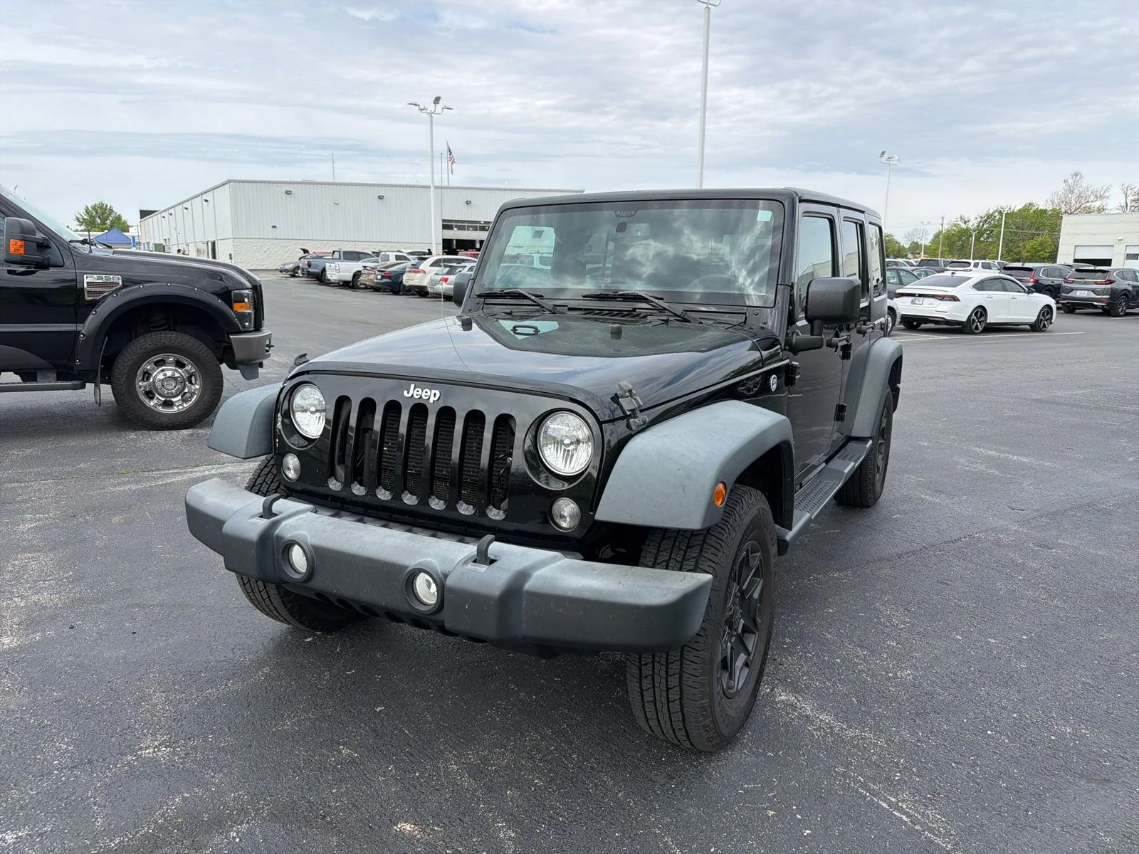 Used 2016 Jeep Wrangler Unlimited Sport with VIN 1C4BJWDG8GL114322 for sale in Lima, OH