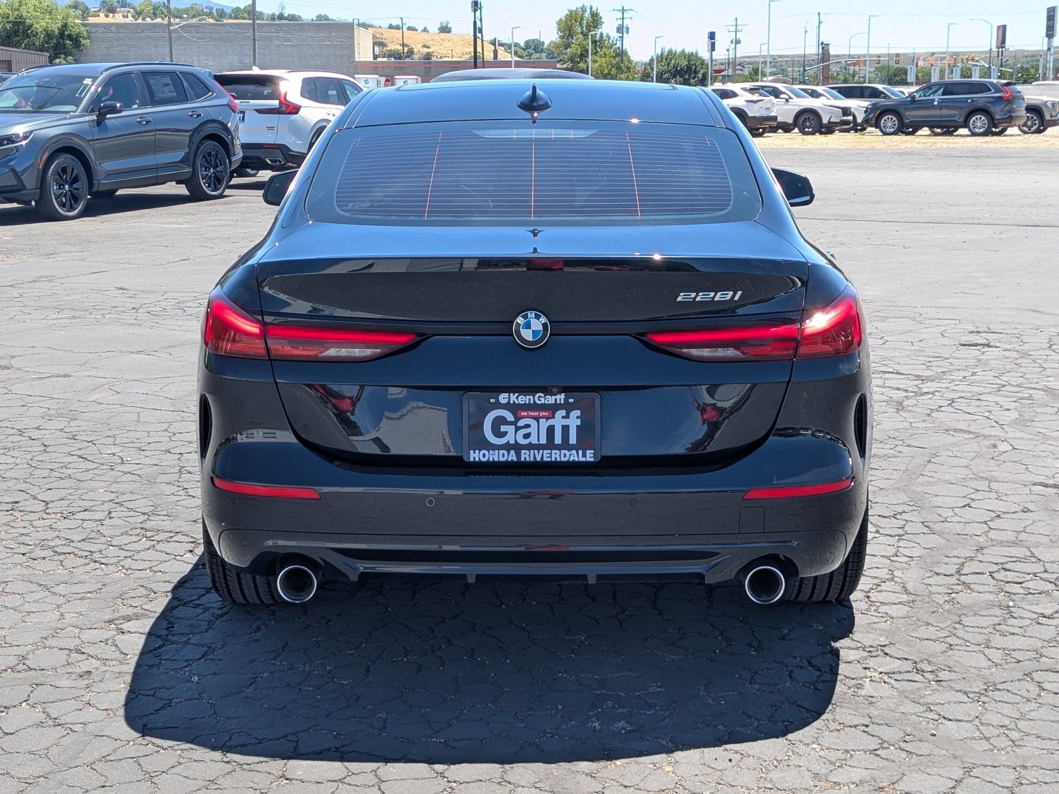 Used 2024 Black Sapphire Metallic BMW 228i image 4