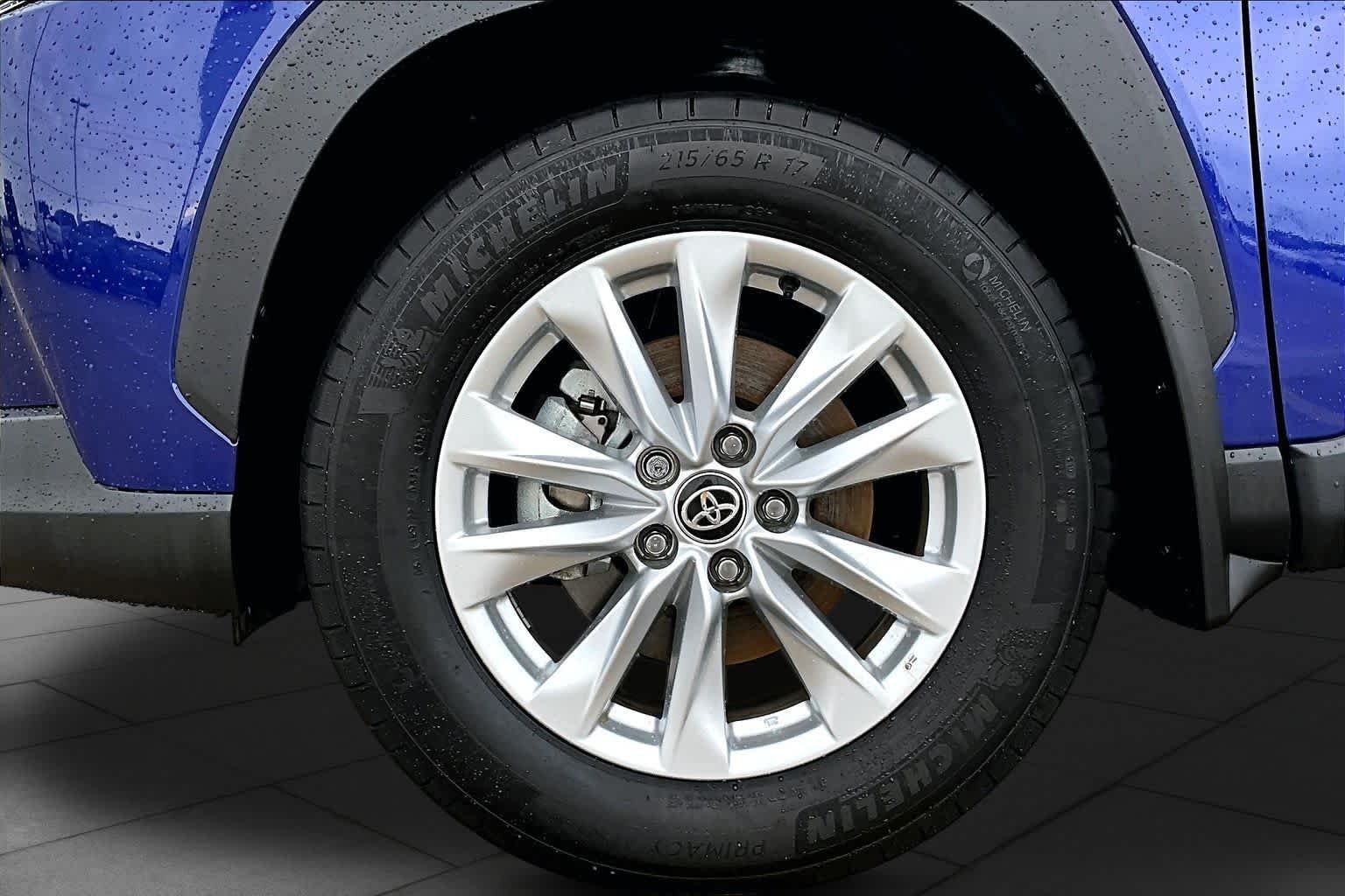 Used 2025 Blue Crush Metallic Toyota LE image 11