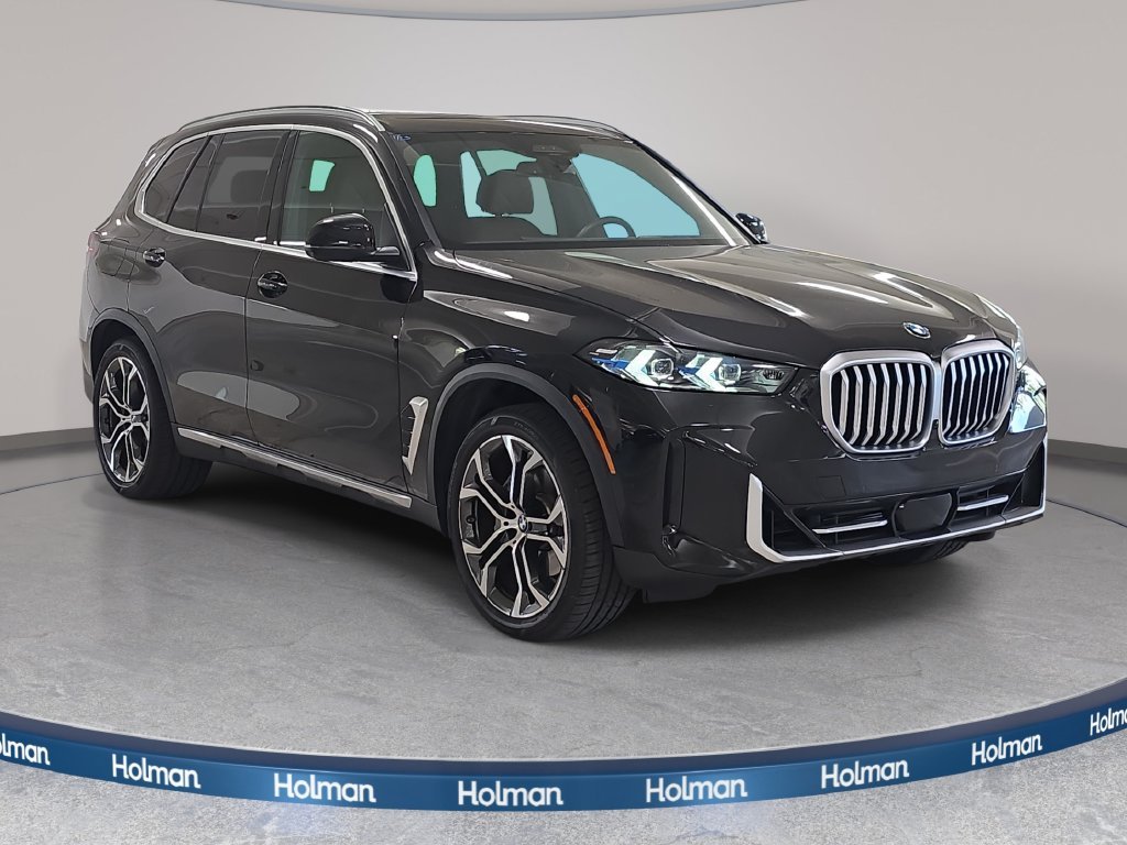Used 2026 Black Sapphire Metallic BMW sDrive40i image 3