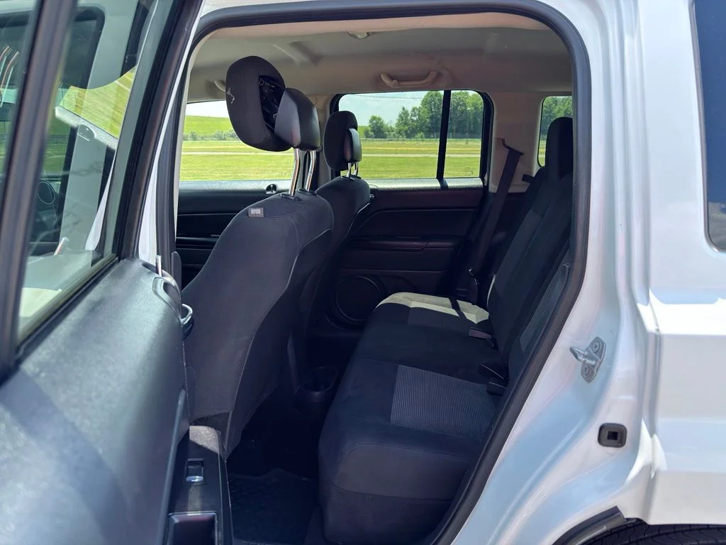 Used 2015 White Jeep Sport image 25