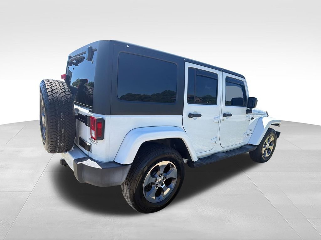 Used 2016 White Jeep Unlimited Sahara image 5