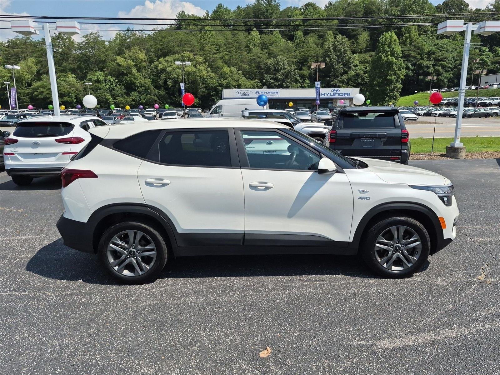 Used 2023 Snow White Pearl Kia LX image 6