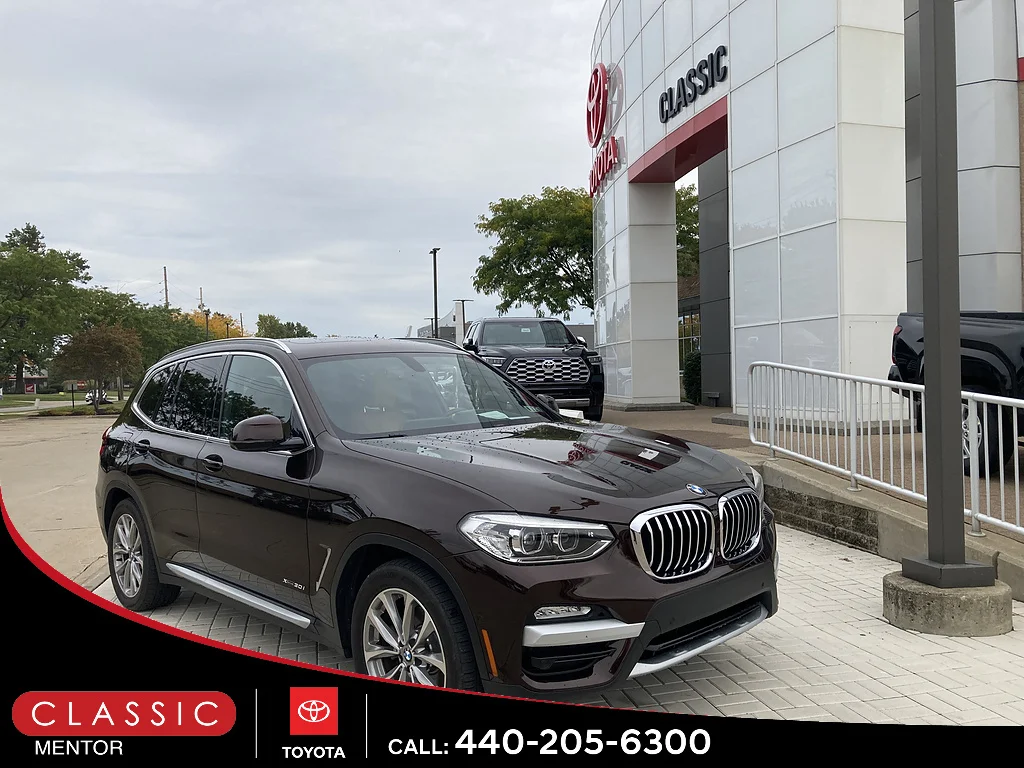 Used 2018 Terra Brown Metallic BMW xDrive30i image 1