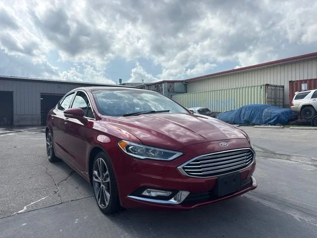 Used 2017 Red Ford Titanium image 1