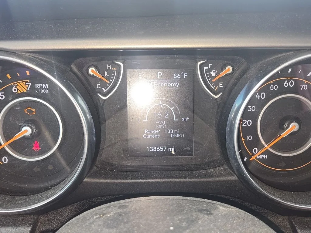 Used 2019 Black Jeep Unlimited Sport S image 1