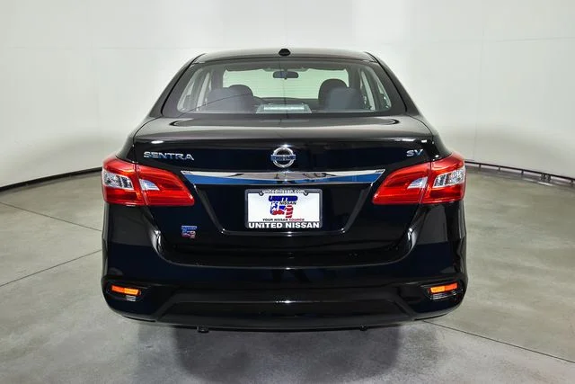 Used 2019 Black Nissan SV image 4