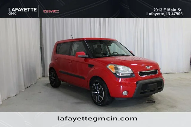 Used 2010 Red Kia Plus image 1