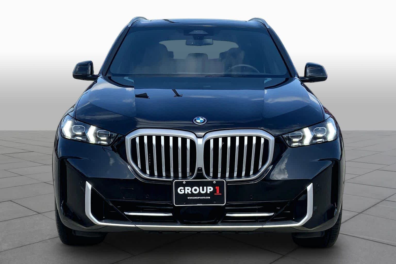 Used 2025 Black Sapphire Metallic BMW xDrive50e image 4