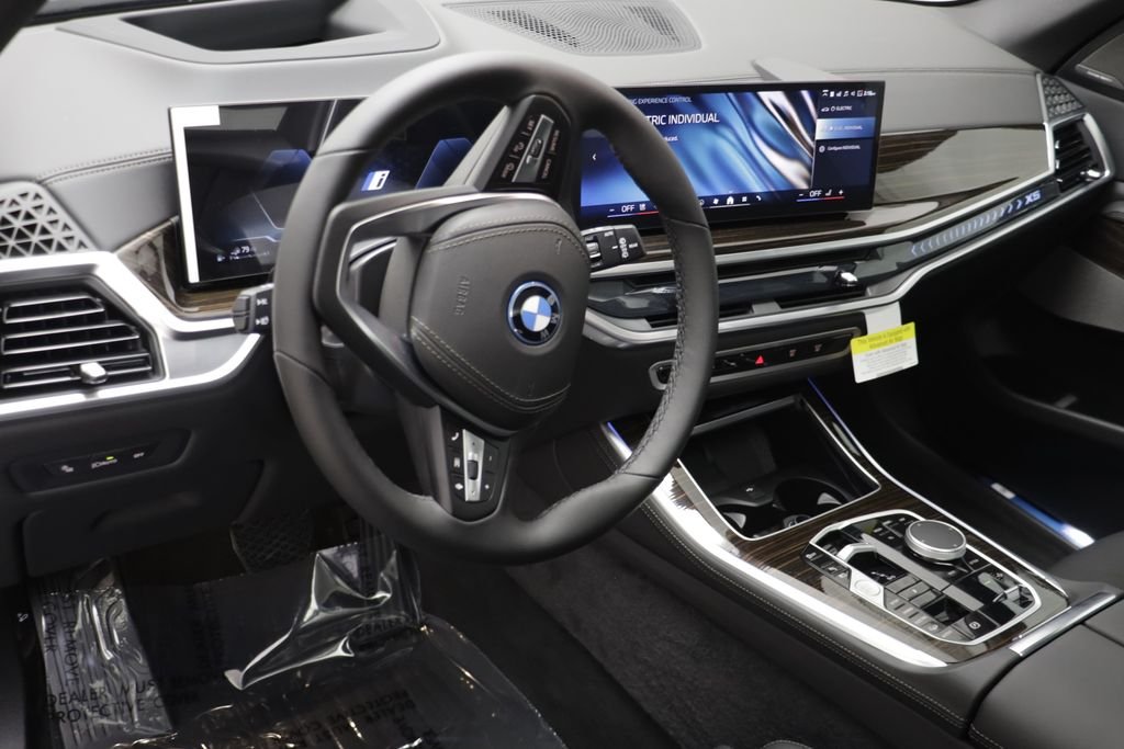 New 2026 Black Sapphire Metallic BMW xDrive50e image 8