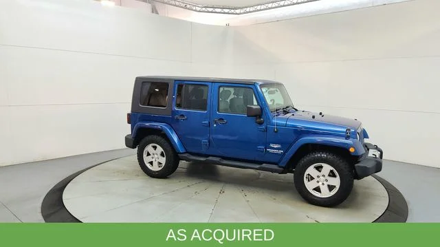 Used 2010 Blue Jeep Unlimited Sahara image 13