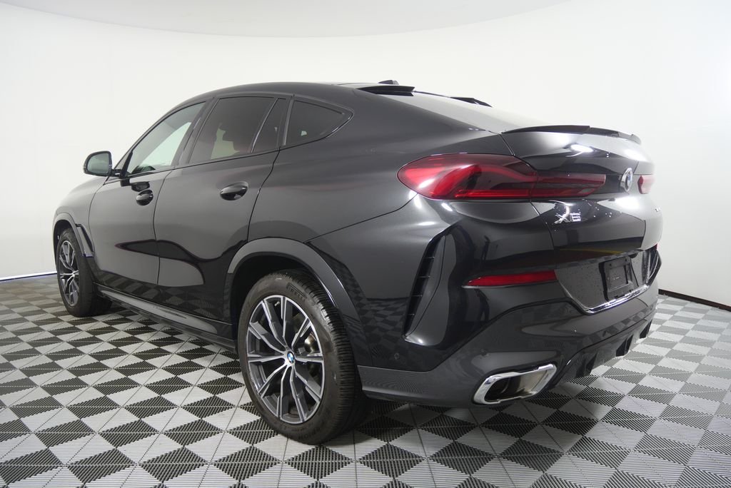 Certified Used 2025 Black Sapphire Metallic BMW xDrive40i image 4