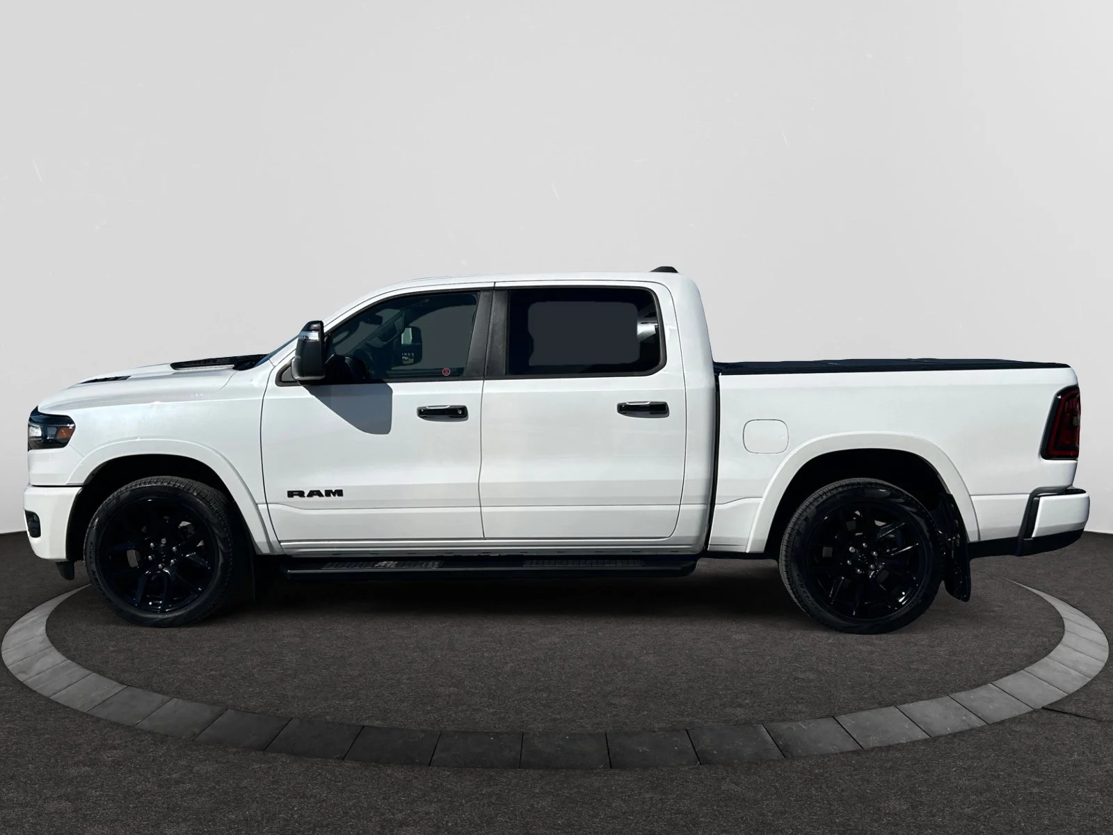 Used 2025 Ivory Tri-Coat Pearl Ram Laramie image 2