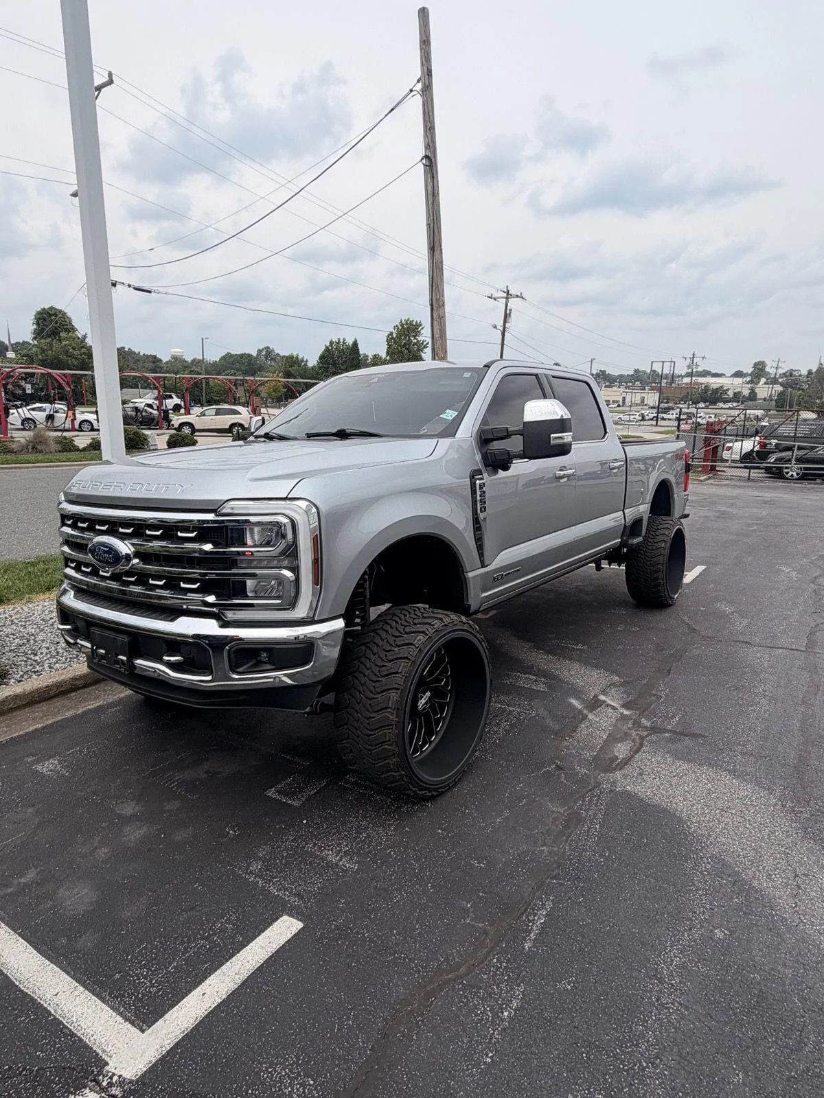 Used 2024 Iconic Silver Metallic Ford LARIAT image 1