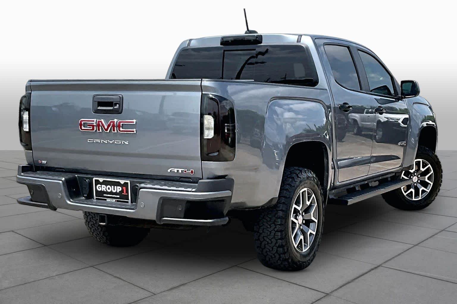 Used 2022 Satin Steel Metallic GMC 4WD AT4 w/Leather image 13