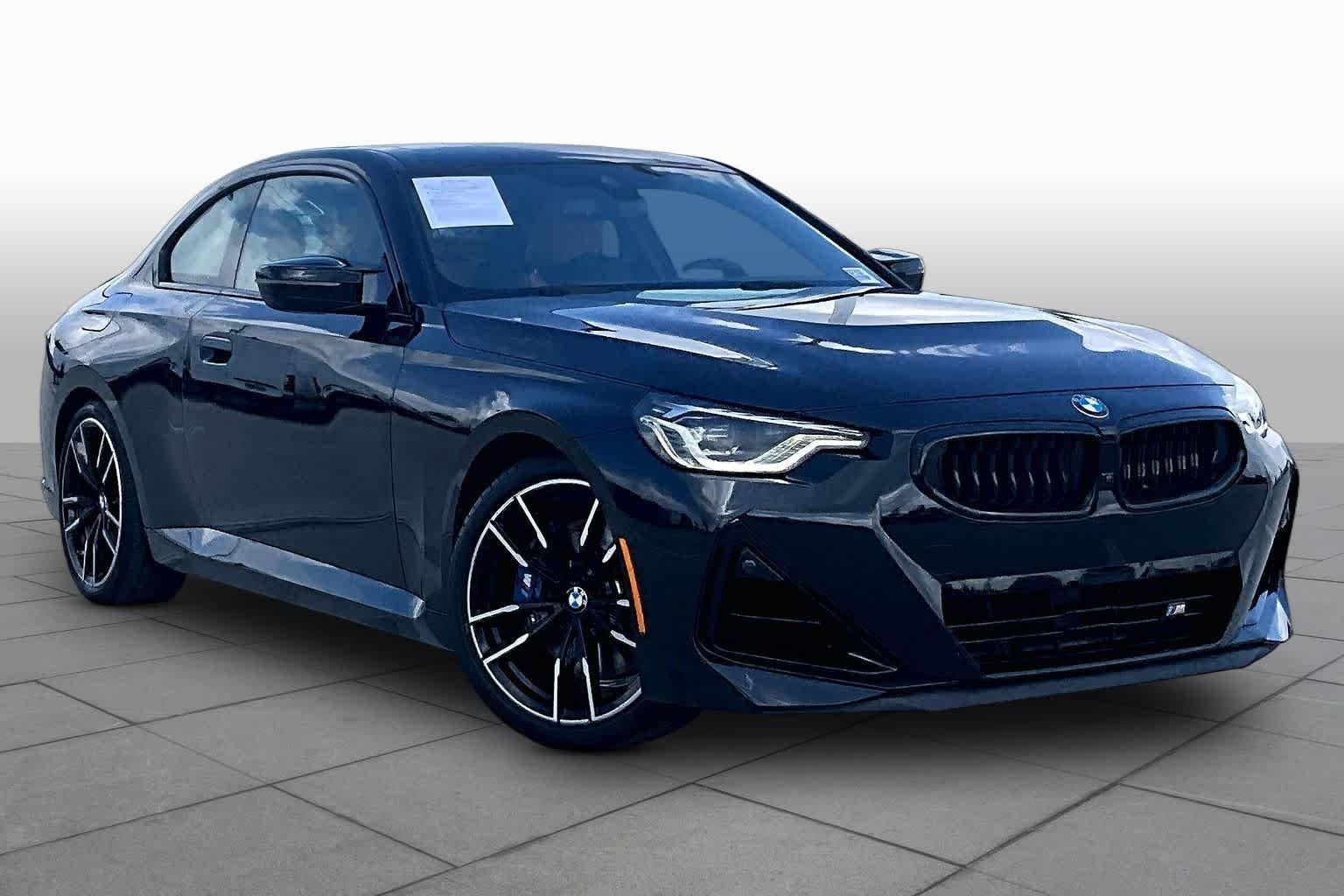 Used 2025 Black Sapphire Metallic BMW M240i image 2