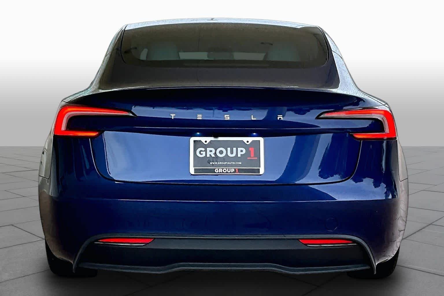 Used 2025 Solid Black Tesla Long Range image 4