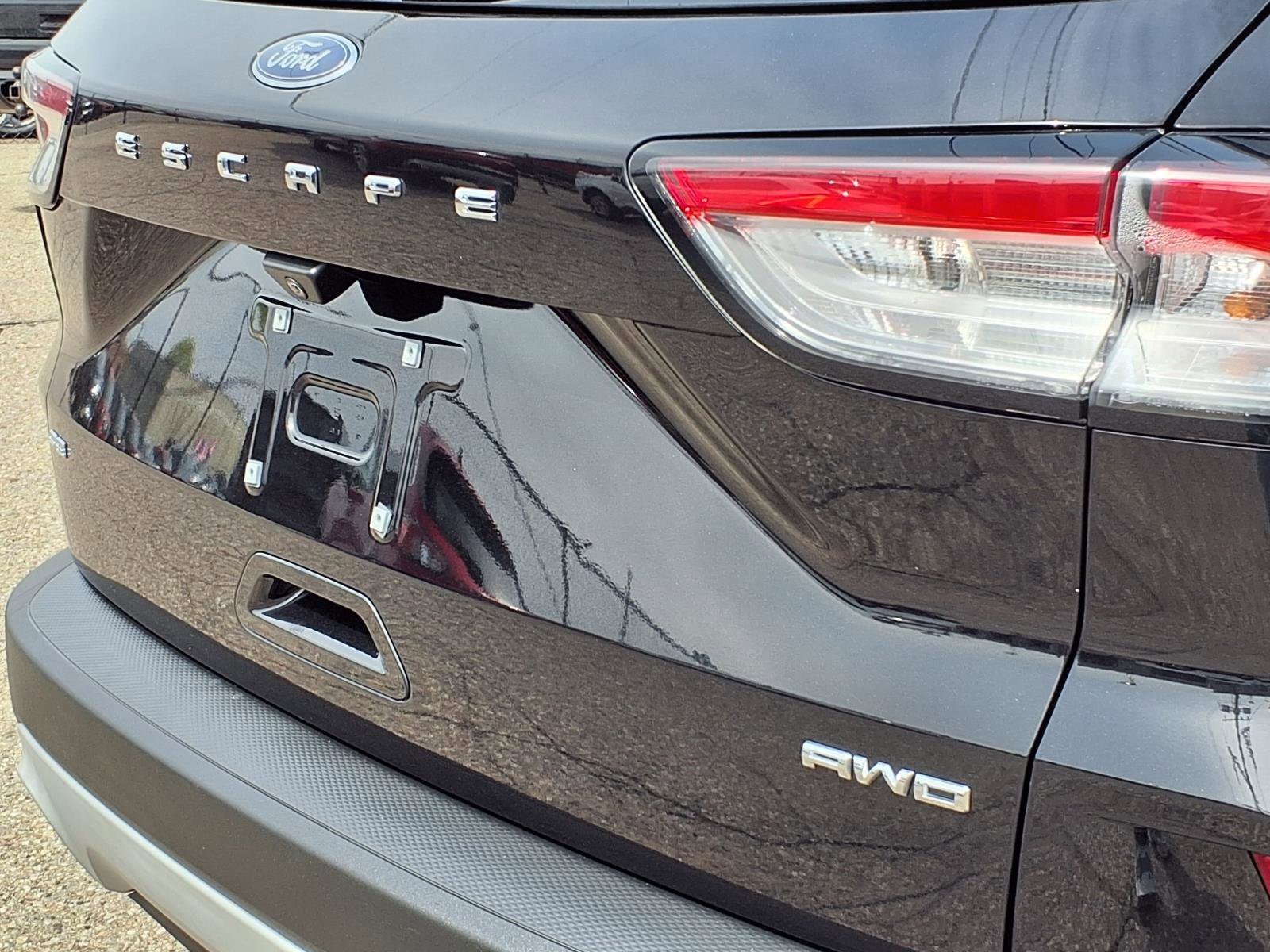 Certified Used 2021 Agate Black Metallic Ford SE image 25