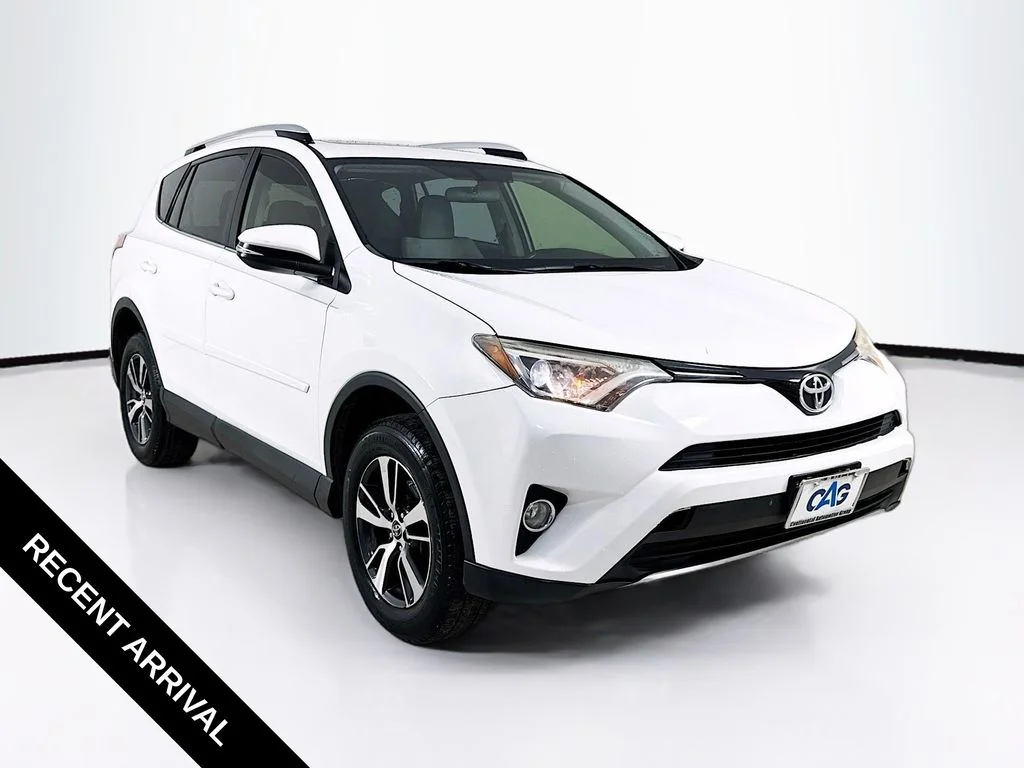 Used 2016 Super White Toyota XLE image 1