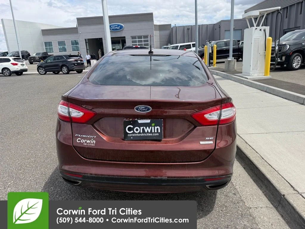 Used 2015 Bronze Fire Metallic Tinted Clearcoat Ford SE image 11