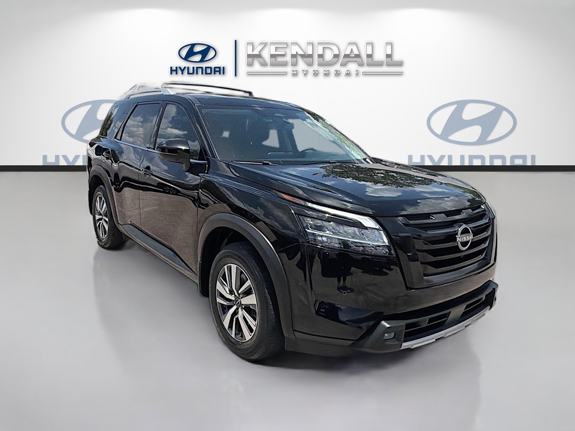 Used 2024 Super Black Nissan SL image 1
