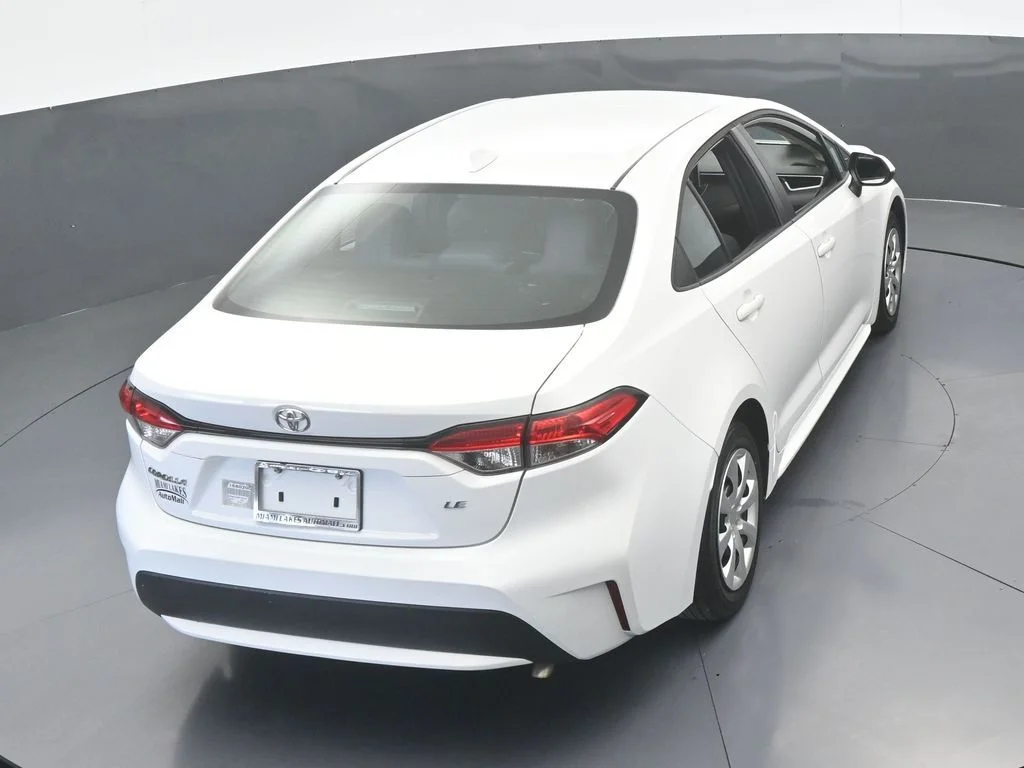 Used 2021 Super White Toyota LE image 39