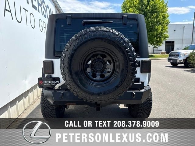 Used 2013 White Jeep Unlimited Sport image 5