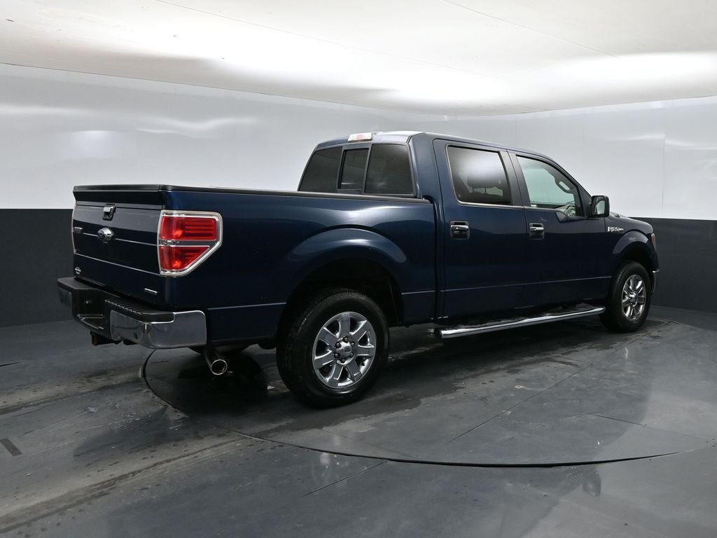Used 2014 Ford F-150 XLT with VIN 1FTFW1CF9EKD05586 for sale in McPherson, KS