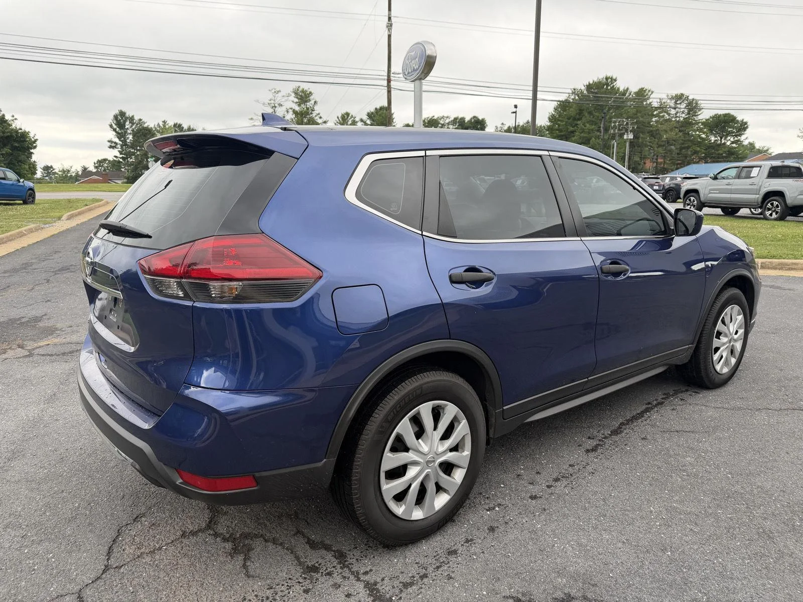 Used 2019 Caspian Blue Metallic Nissan S image 4