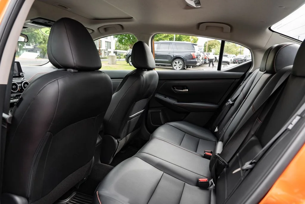 Certified Used 2025 Orange Nissan SR image 25