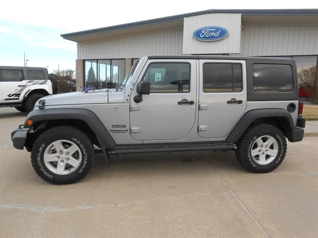 Used 2016 Jeep Wrangler Unlimited Sport S with VIN 1C4HJWDG4GL273736 for sale in Tyndall, SD