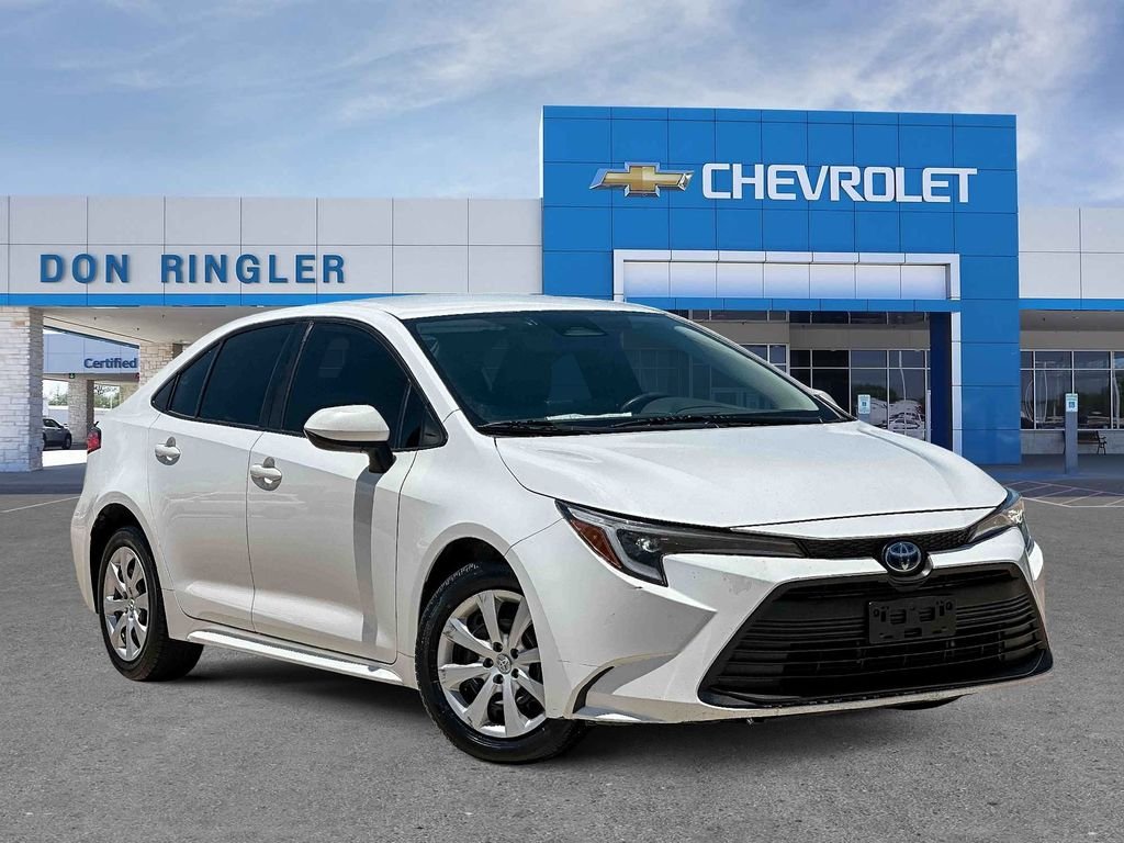 Used 2023 White Toyota LE image 1