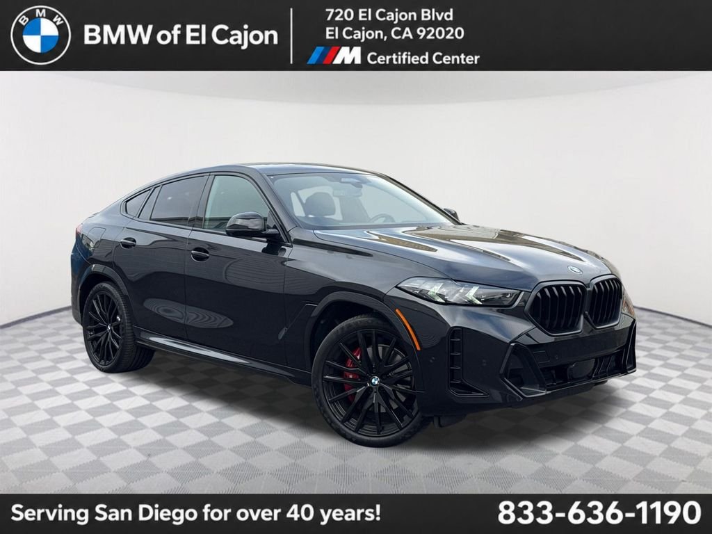 Used 2024 Black BMW xDrive40i image 1