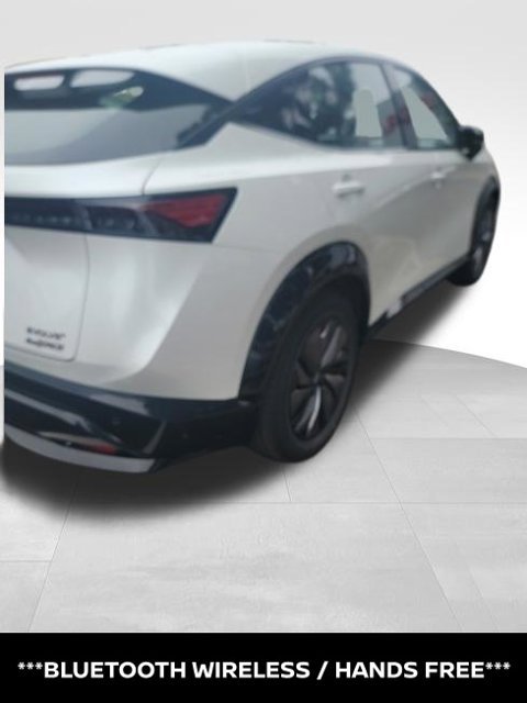 Certified Used 2024 White Nissan EVOLVE+ e-4ORCE image 3
