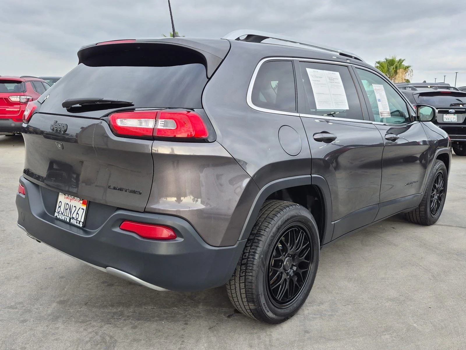 Used 2016 Granite Crystal Metallic Clearcoat Jeep Limited image 6