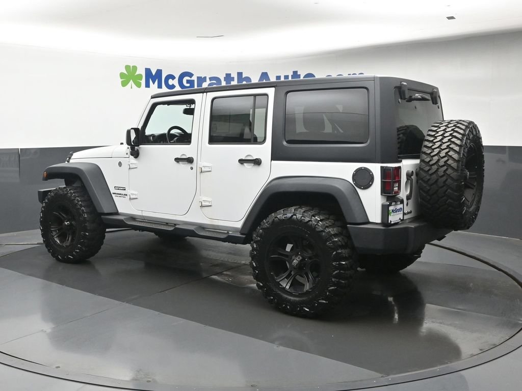 Used 2014 White Jeep Unlimited Sport image 25